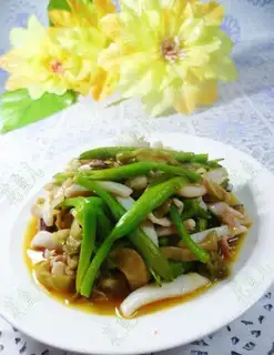 Squeeze the veggies and fire the squid