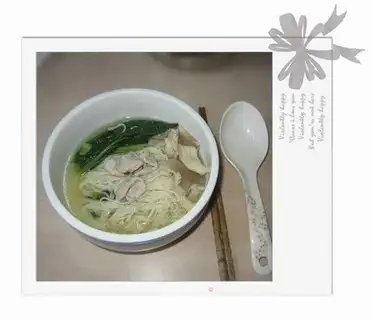 Noodles in soup with pork slices