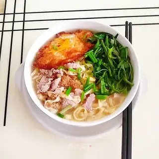 Hands on egg noodles
