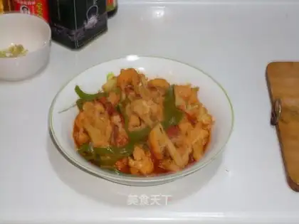 Stewed cauliflower with tomato