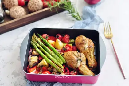 Roasted vegetables and chicken legs