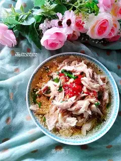 Tore chicken with onions