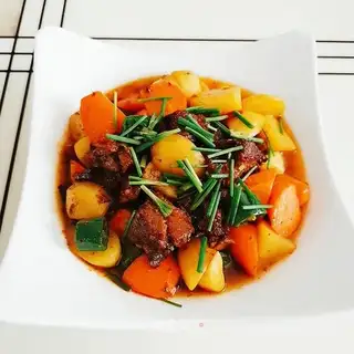 Cow roast potatoes and carrots