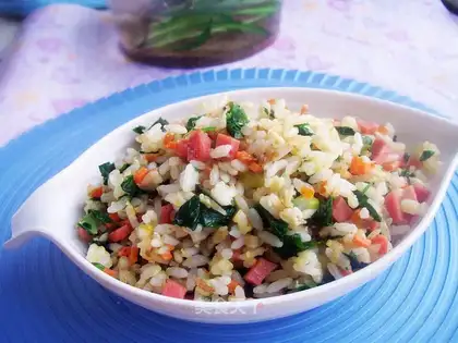 stir-fried rice with celery and vegetable leaves