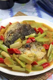 Salmon stewed with pumpkin and celery
