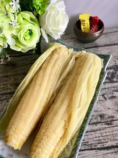 Cook corn with shells