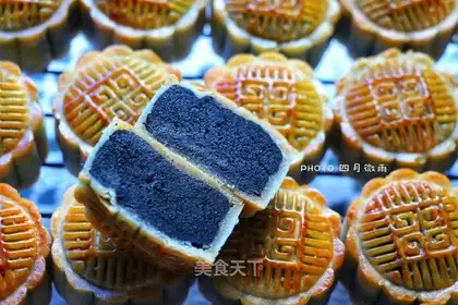 A broad black sesame lunar pie