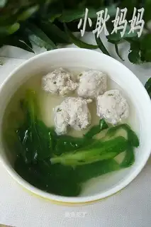 Chicken feather vegetable meatball soup