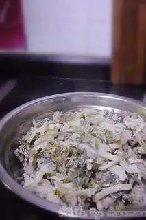 Steamed potatoes and celery leaves