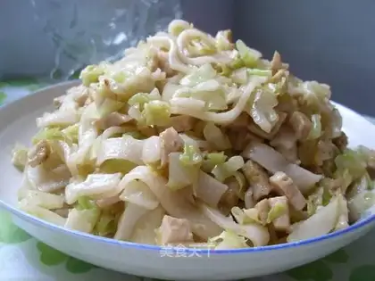 Fried kway teow rice pie and cabbage