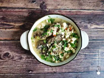 Black fish tofu soup