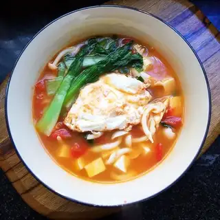 White mushroom tofu soup