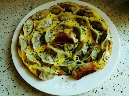 Three fried dumplings carrying eggs
