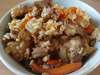 The lamb's hand grabs rice