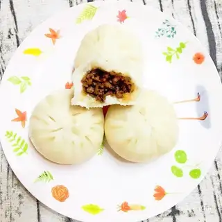 A meat bag with mushroom sauce