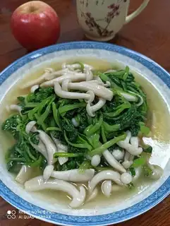 The greens are burning white mushrooms