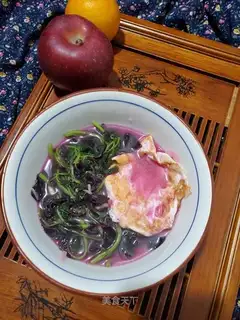 Red gravy and egg soup