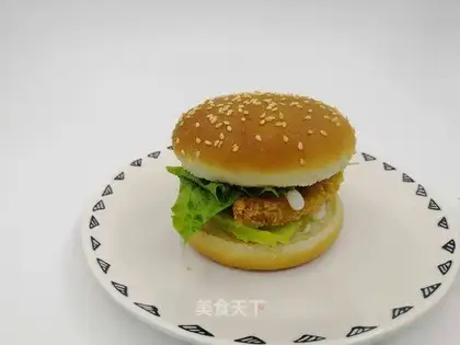 A chicken steak burger