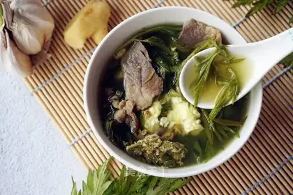 Eggs and leaves soup