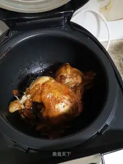 A chicken with a pan