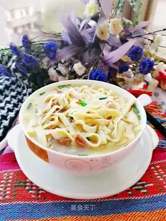 Hands on egg noodles