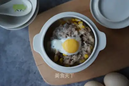 One person eats eggs and meatloaf