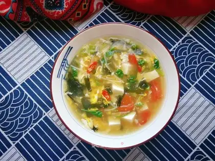 Golden pins and mushrooms, sprouts and eggs soup