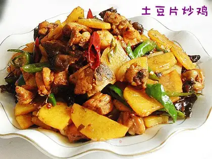 Fried chicken with potato slices