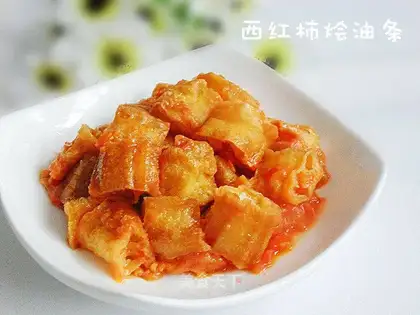 Stewed fried dough sticks with tomatoes