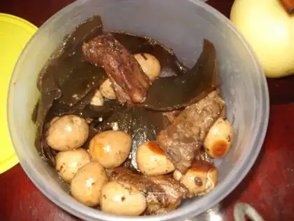 Stewed egg with pork ribs and seaweed