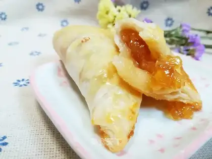 Peach pie with a hand