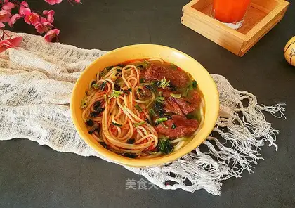 Sucking on the oxen noodles
