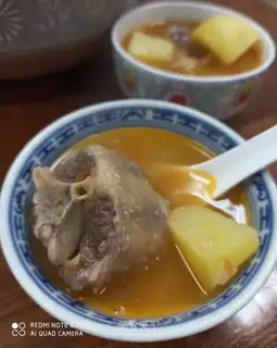 Tomato potato tail soup