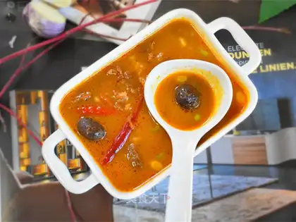 Black garlic tomato beef soup