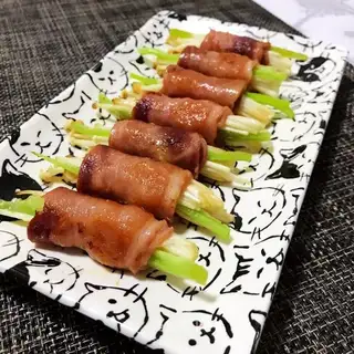 Gin and mushroom bacon rolls