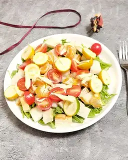 A salad with chrysanthemum fruit