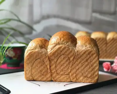 A black malt toast with a flamingo
