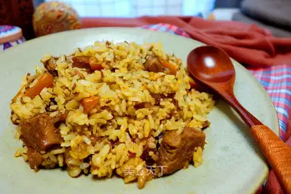 The lamb's hand grabs rice