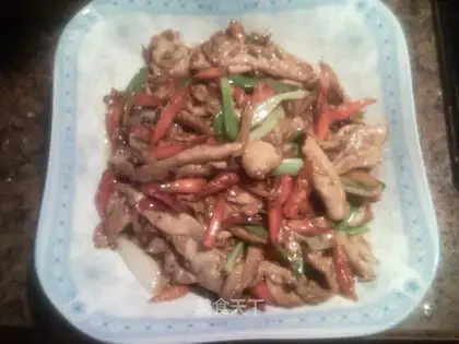 Sauteed pork slices with millet and spicy rice