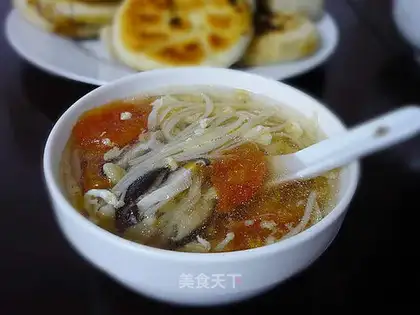 Mushroom and tomato egg soup