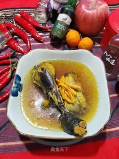 A chicken soup with a weed