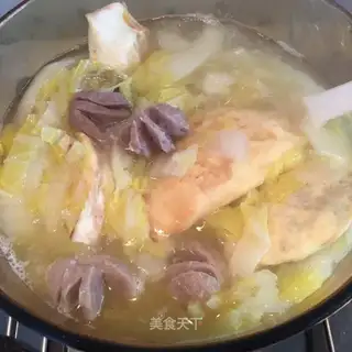 Beefballs, egg dumplings and vegetables soup