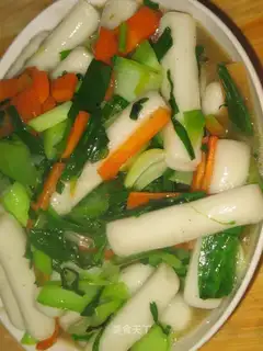 Fried finger rice cake with vegetables