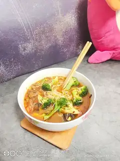 Chicken, soup, blue noodles
