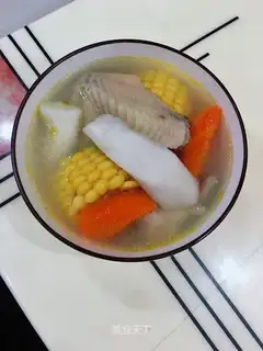 Carrot corn, ginger and chicken soup