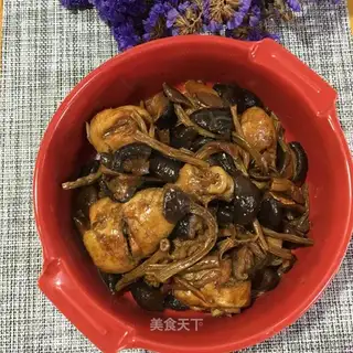 Two mushrooms burning chicken legs