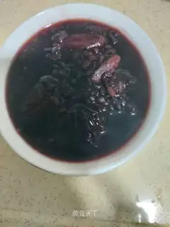 Black rice stewed fish glue