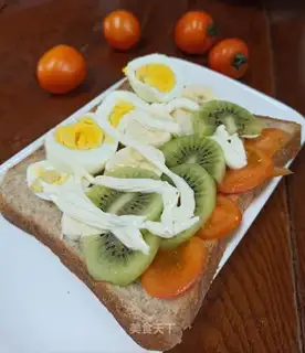 Eggs, fruit, whole wheat sandwich