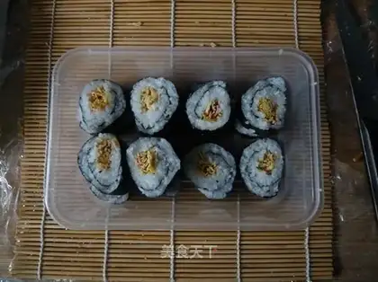 Home-made rice roll with bamboo curtain and seaweed