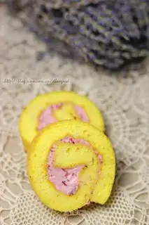 Pumpkin cake roll with bayberry sauce